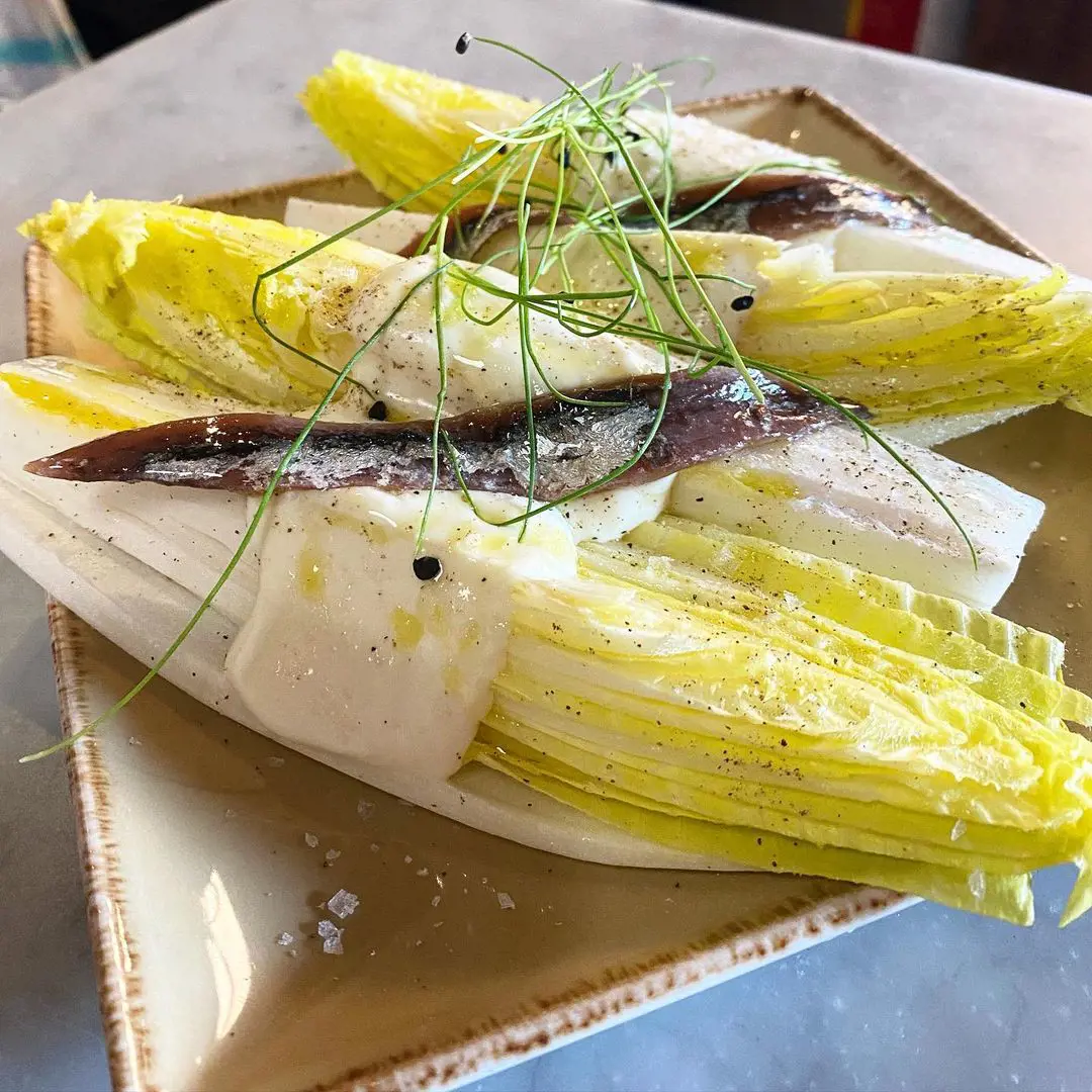 baby gem salad with Torta del Casar and Cantabrian salted anchovies