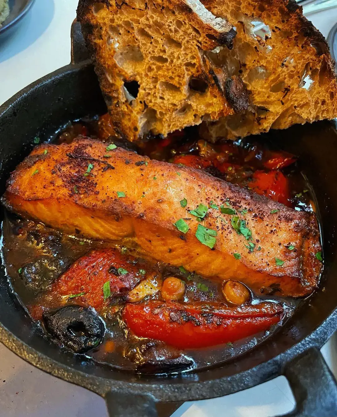 Salmon cooked with Moroccan Chrayme sauce