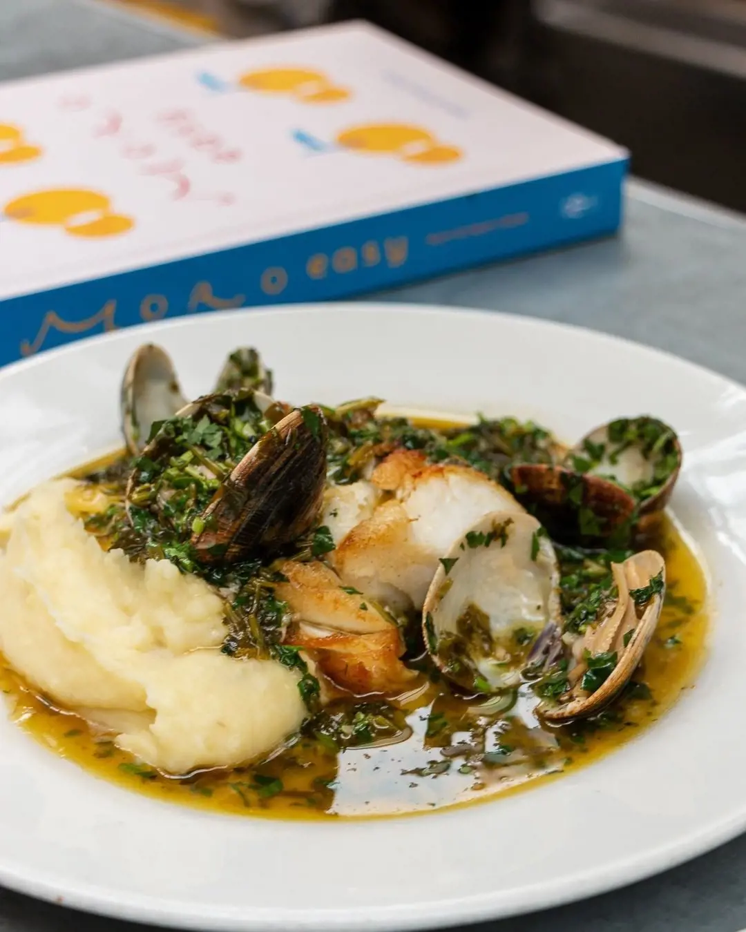 Wood roasted cod with clams, coriander and vinho verde with mashed potato
