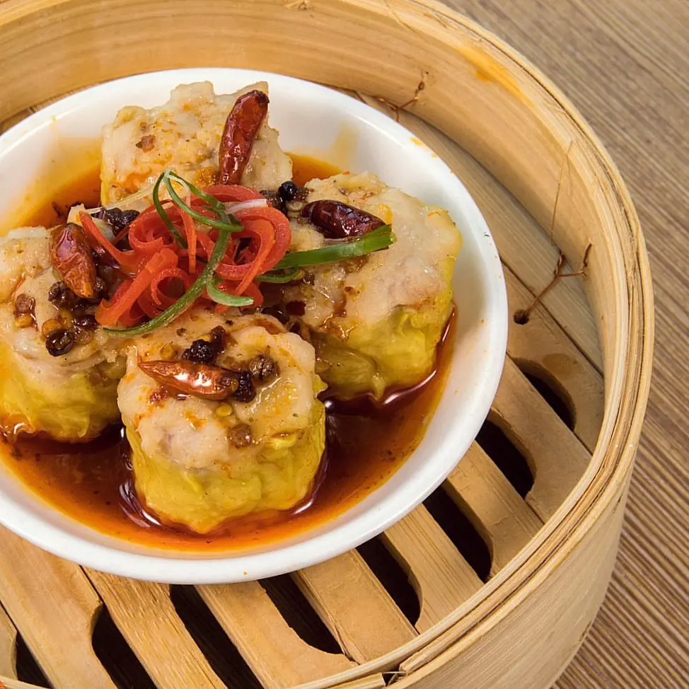 Minced pork shrimp dumplings with chilli oil sauce