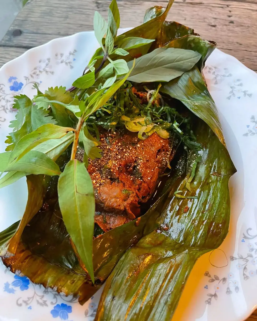 red curry of mallard wrapped in banana leaf
