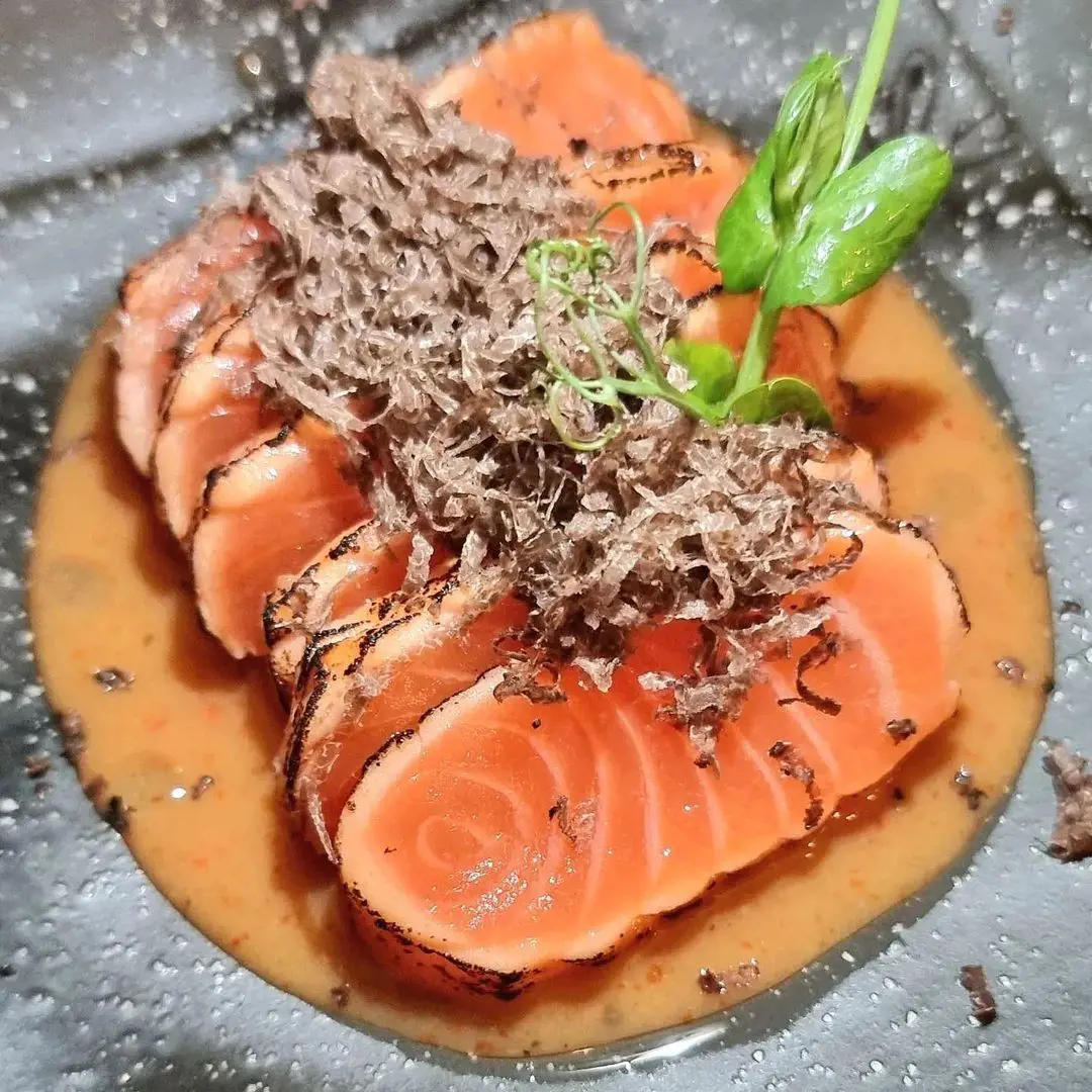 eared salmon sashimi with spicy yuzu miso sauce & fresh truffle