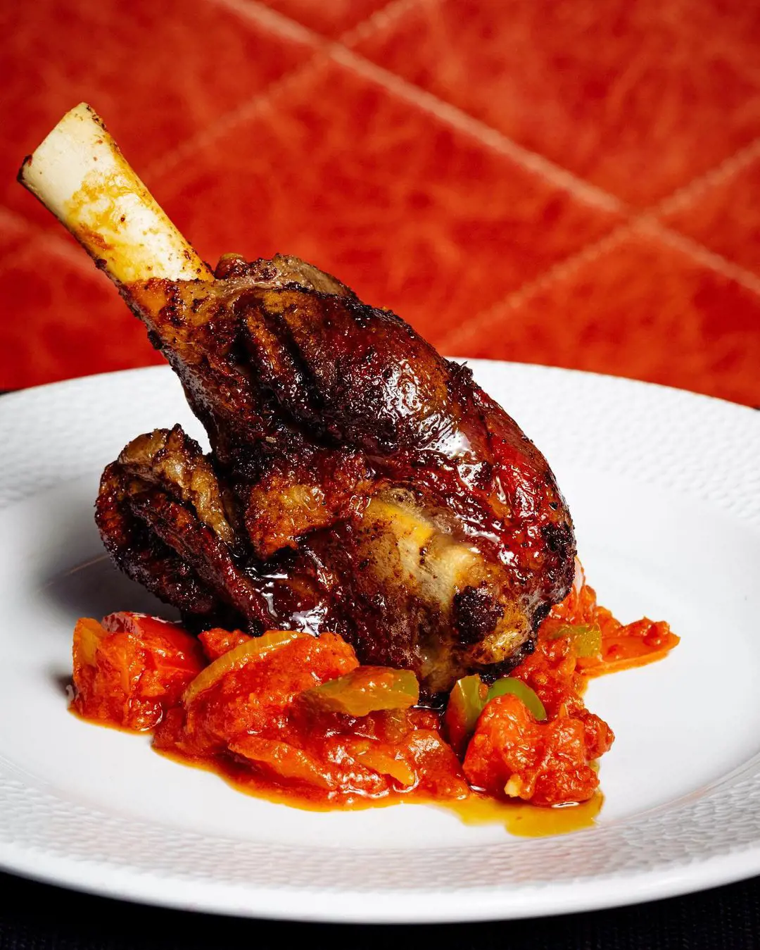 Green harissa slow cooked lam shank with spice ratatouille