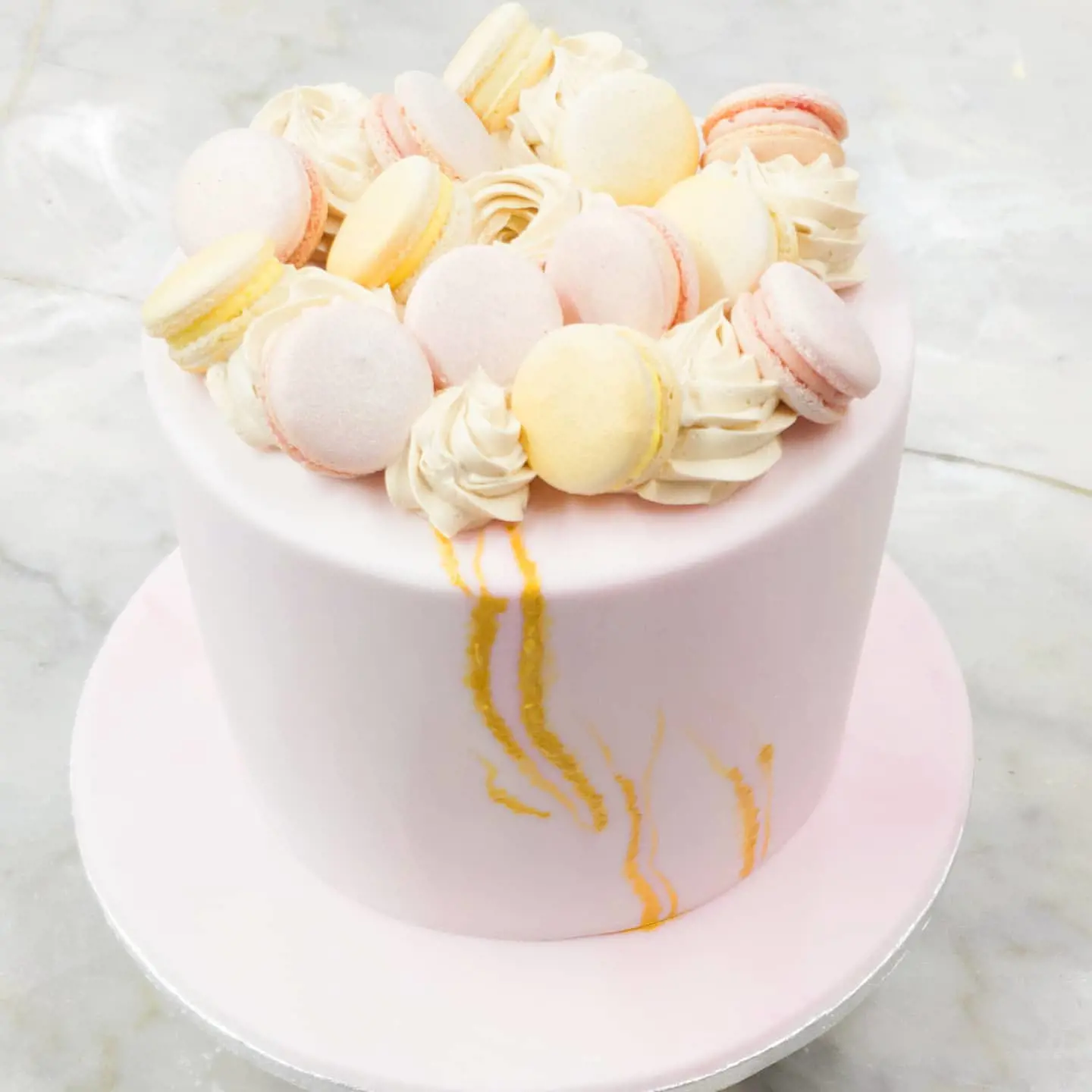 Gold veined white and pink cake 