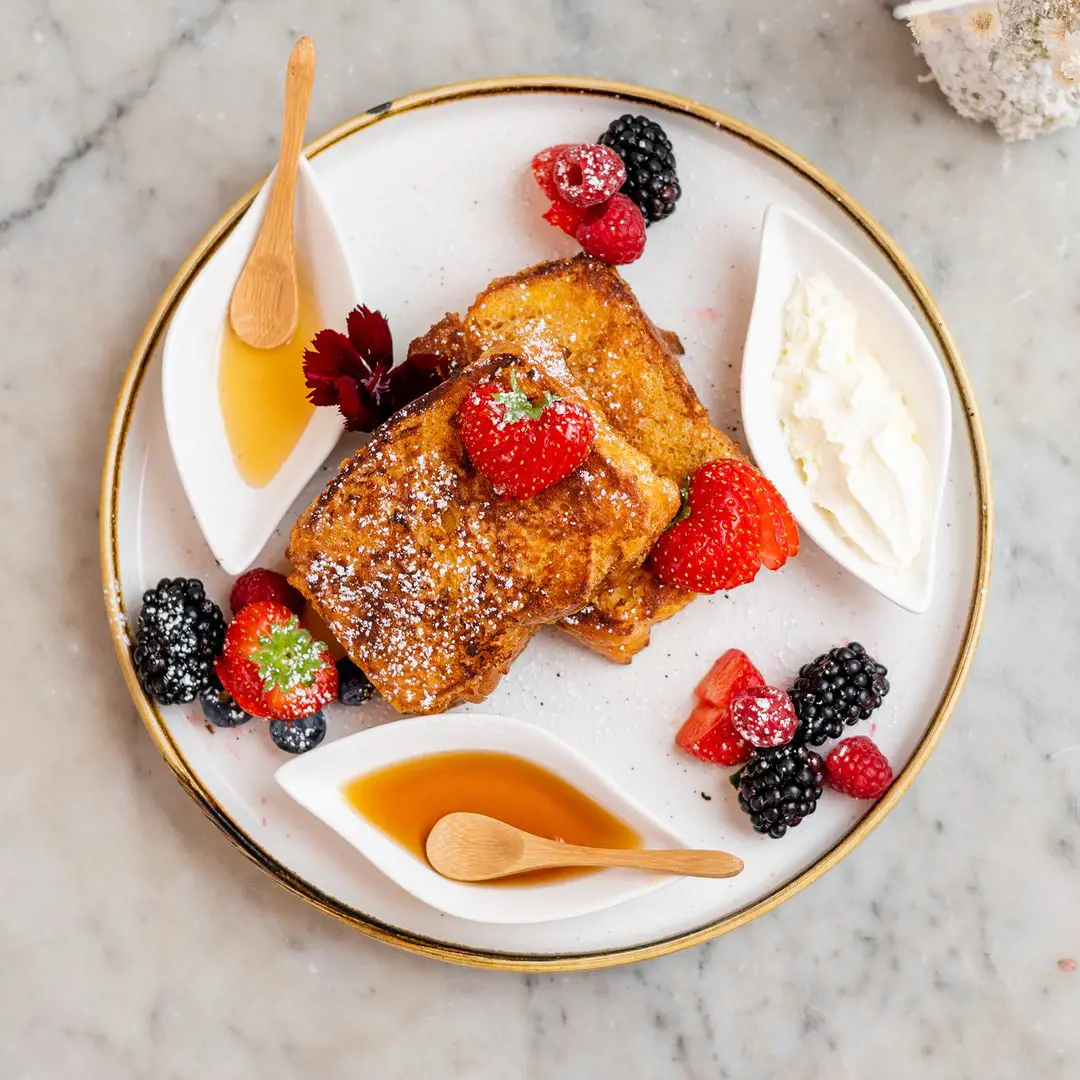 FRENCH TOAST with fruits, chantilly, honey and maple syrup