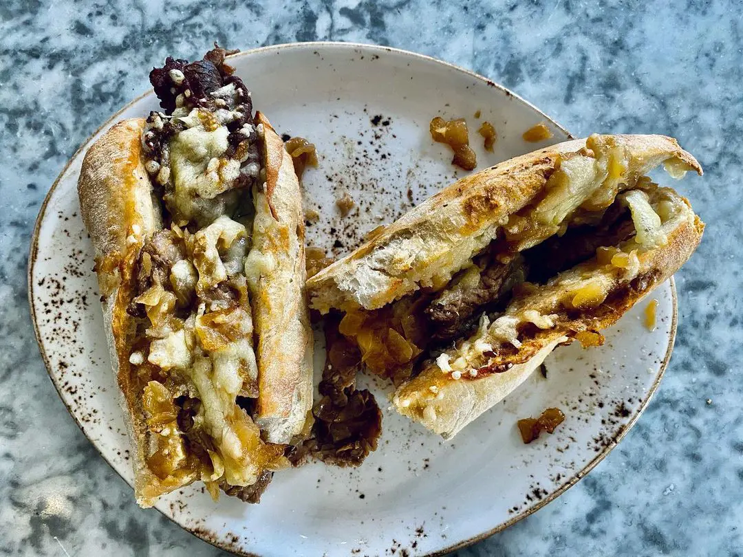 Steak, caramelised onion and cheese melt baguettes