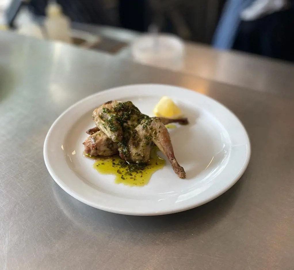 Grilled quail, garlic butter and lemon