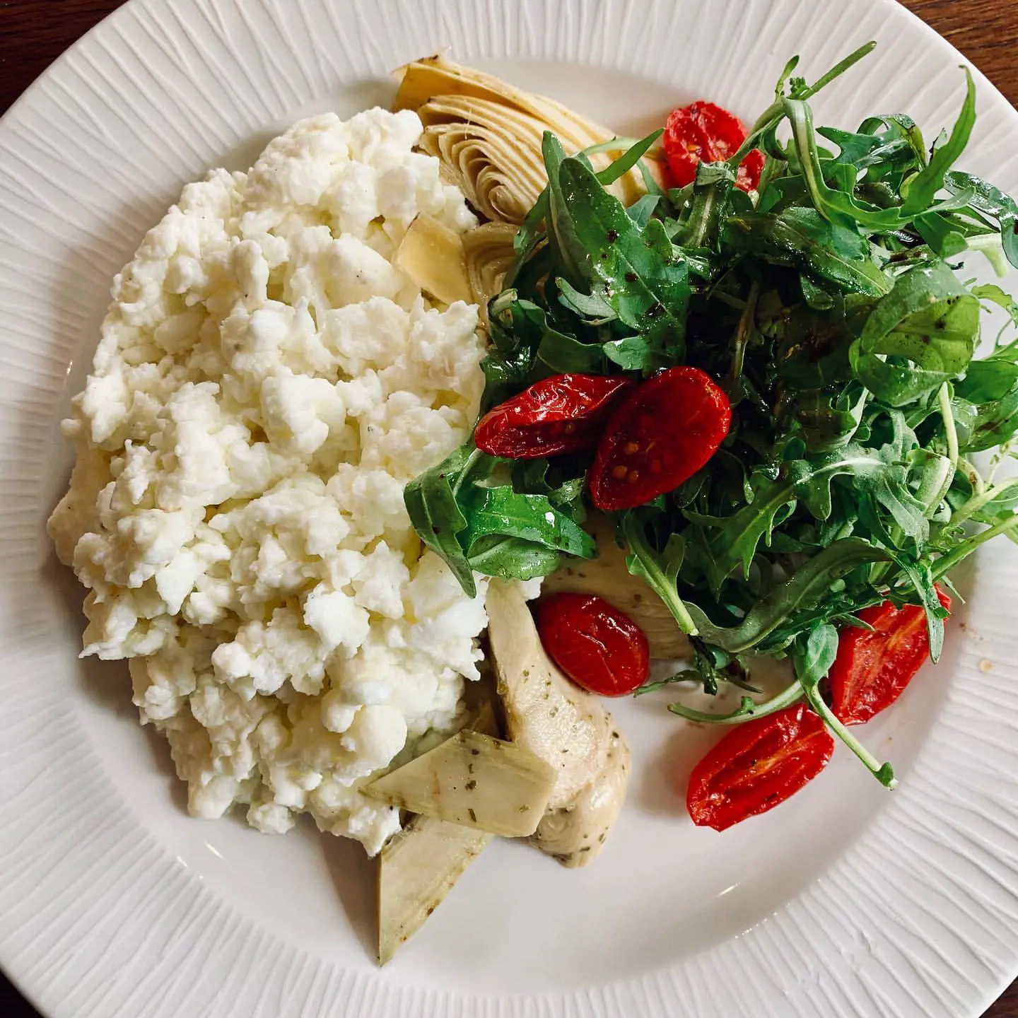 Scrambled egg (white’s only) artichokes, rucola & datterini tomatoes