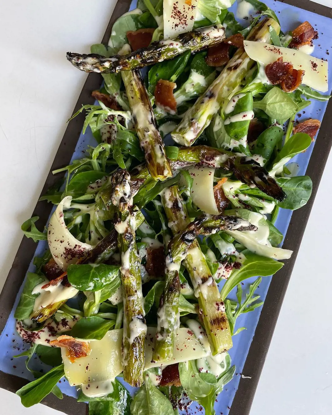 asparagus grilled on charcoals, crispy pancetta, kashkaval, lamb’s lettuce & rocket