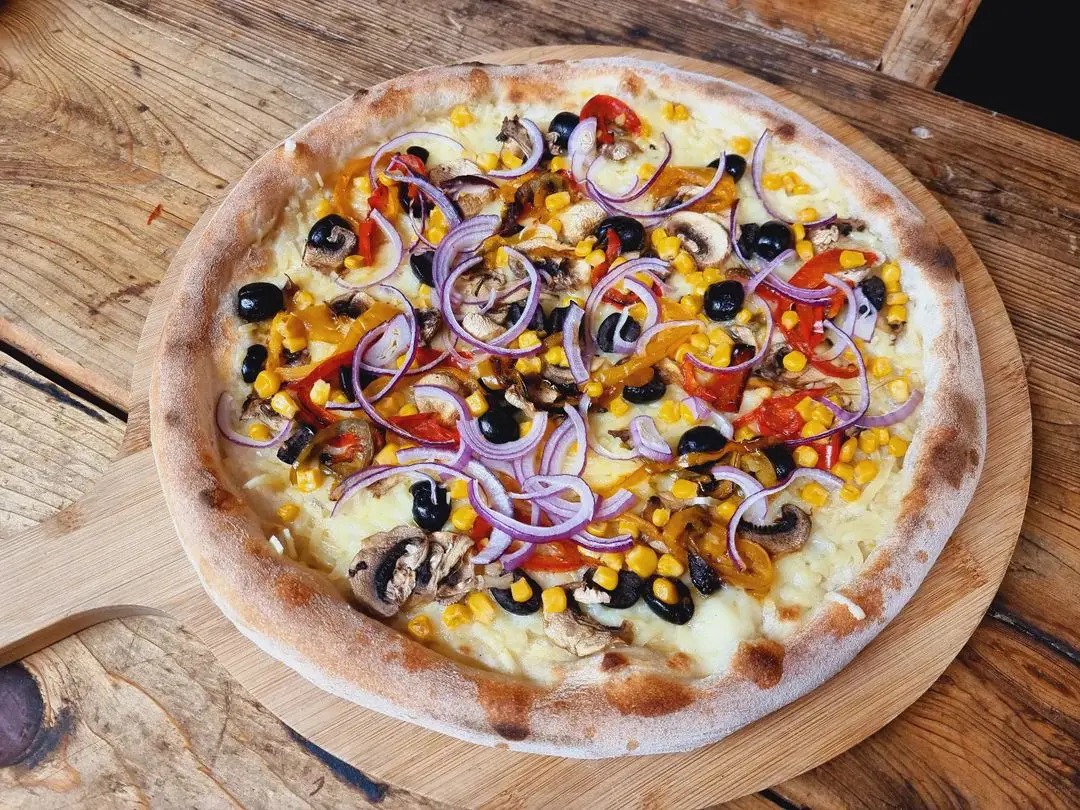 Vegan cheese, mushrooms, sweetcorn, onions, mixed peppers & olives