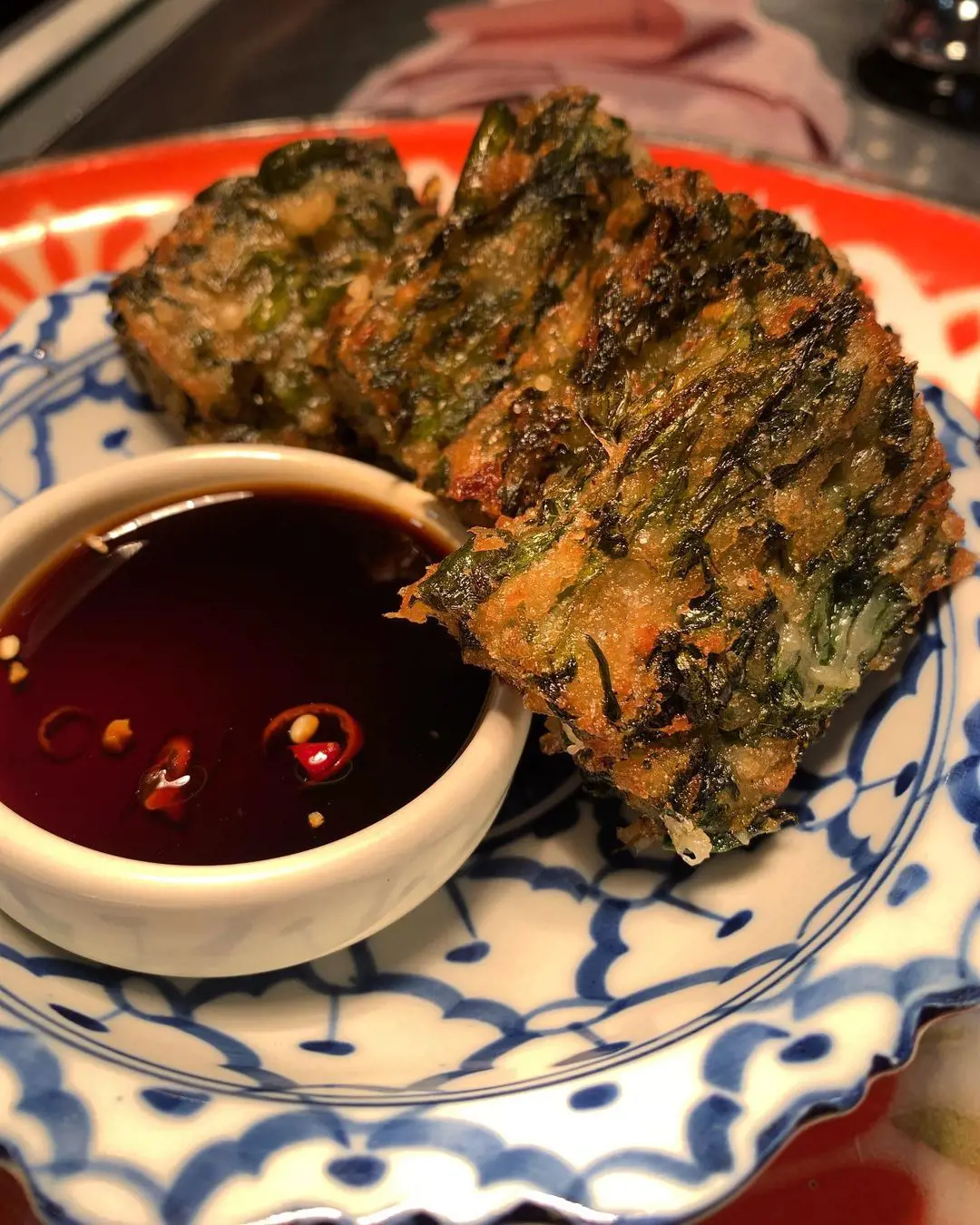 Chive cakes, steamed and fried with a sweet soy dipping sauce