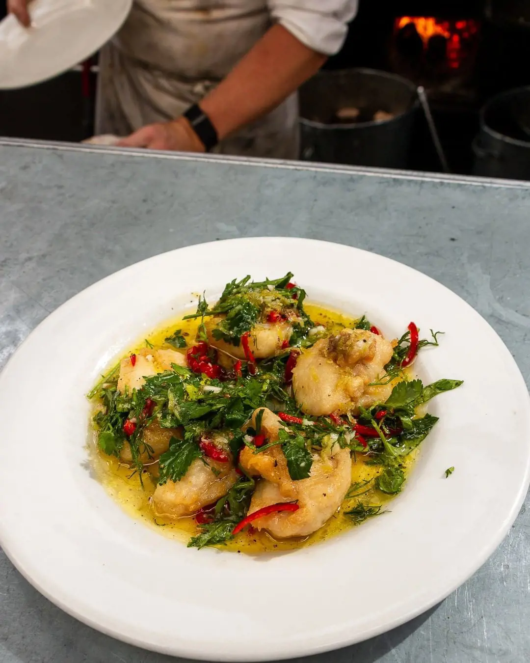 deep-fried cod cheeks with lemon, garlic, dill, coriander and red chilli
