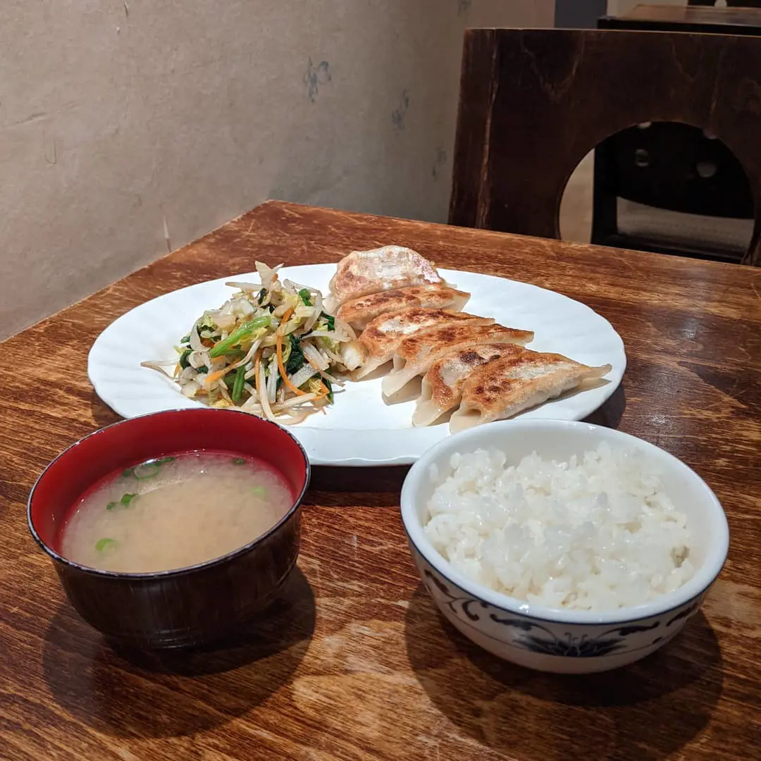 Gyoza set with str fried veg with rice and miso soup.