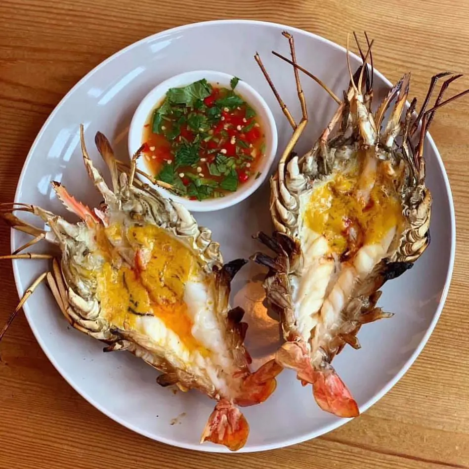 Grill river prawns with spicy dip. 