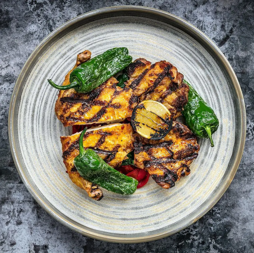 Grilled Harissa Chicken with Piquillo, Padron Peppers & Homemade Lime Mayo