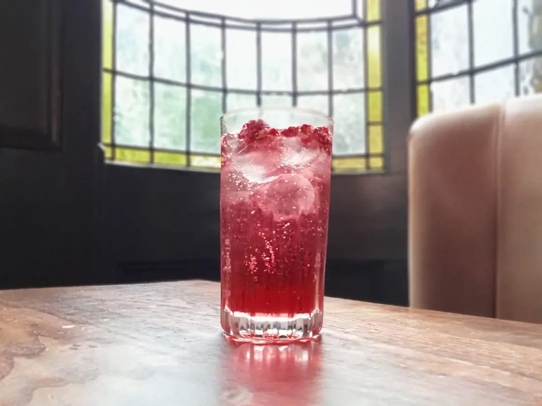 Ginger beer with raspberry syrup