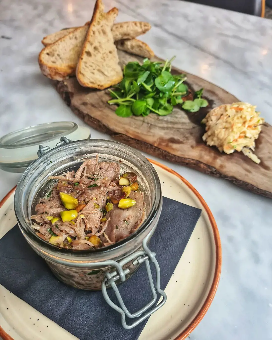 Duck and pistachio rillette with celeriac remounted and sourdough