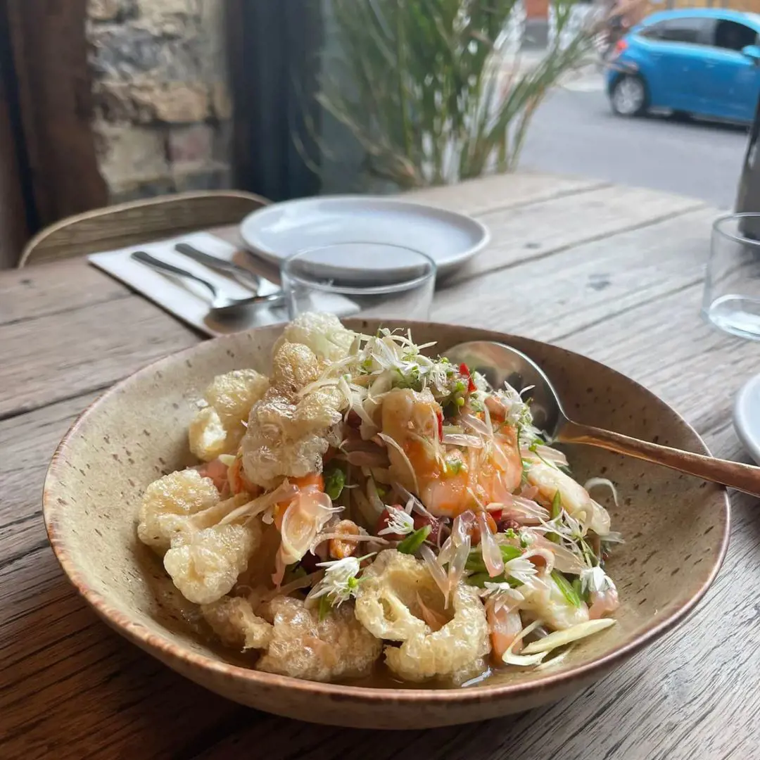 Pink pomelo salad with prawns and pork scratchings
