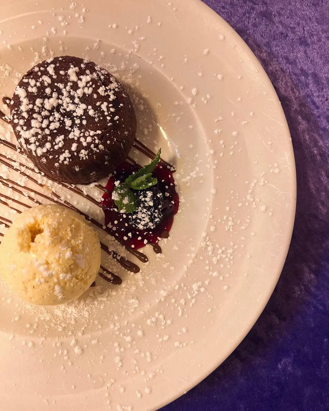 Chocolate Fondant with berrycompote and vanilla ice cream