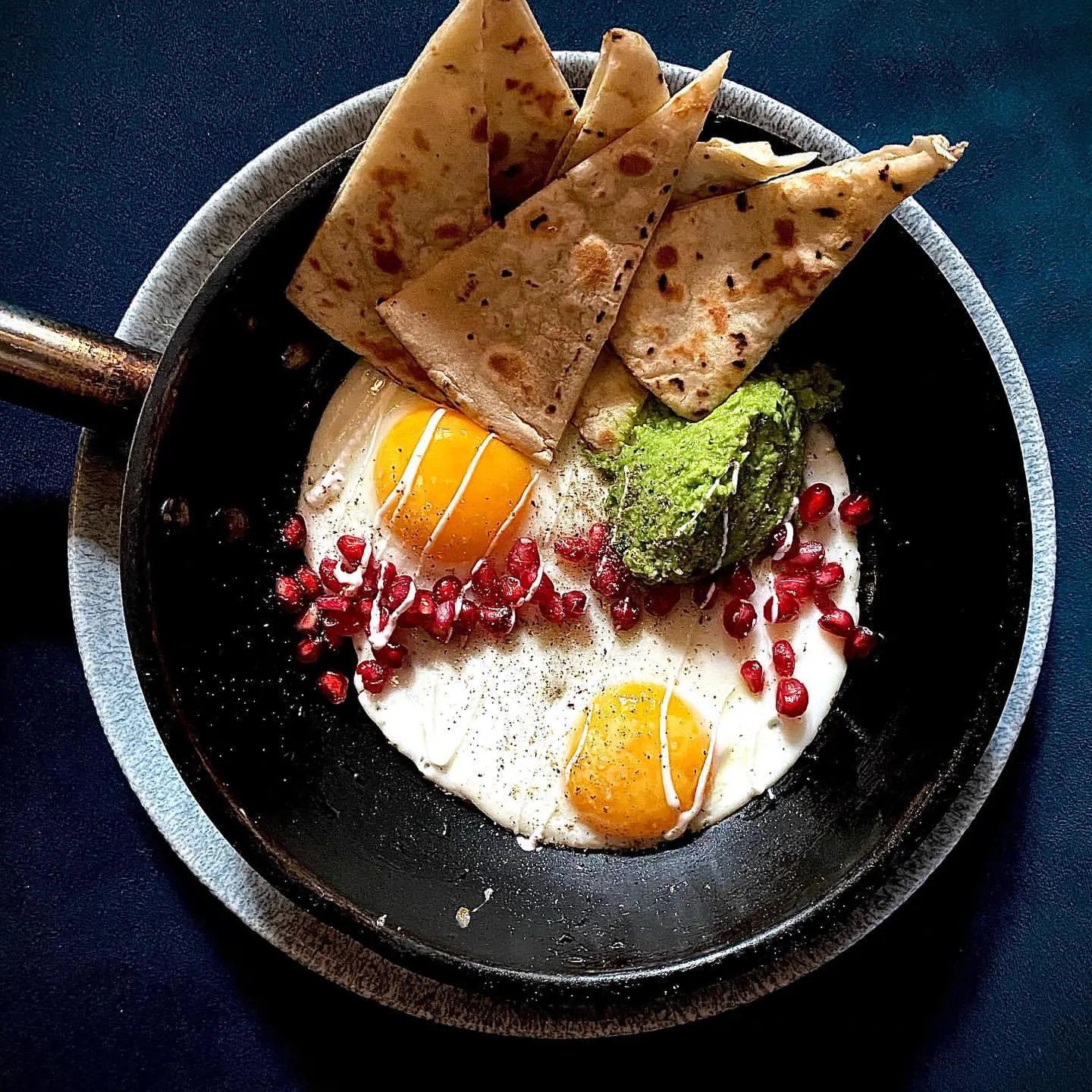 Persian eggs with pea hummus and coconut yogurt 