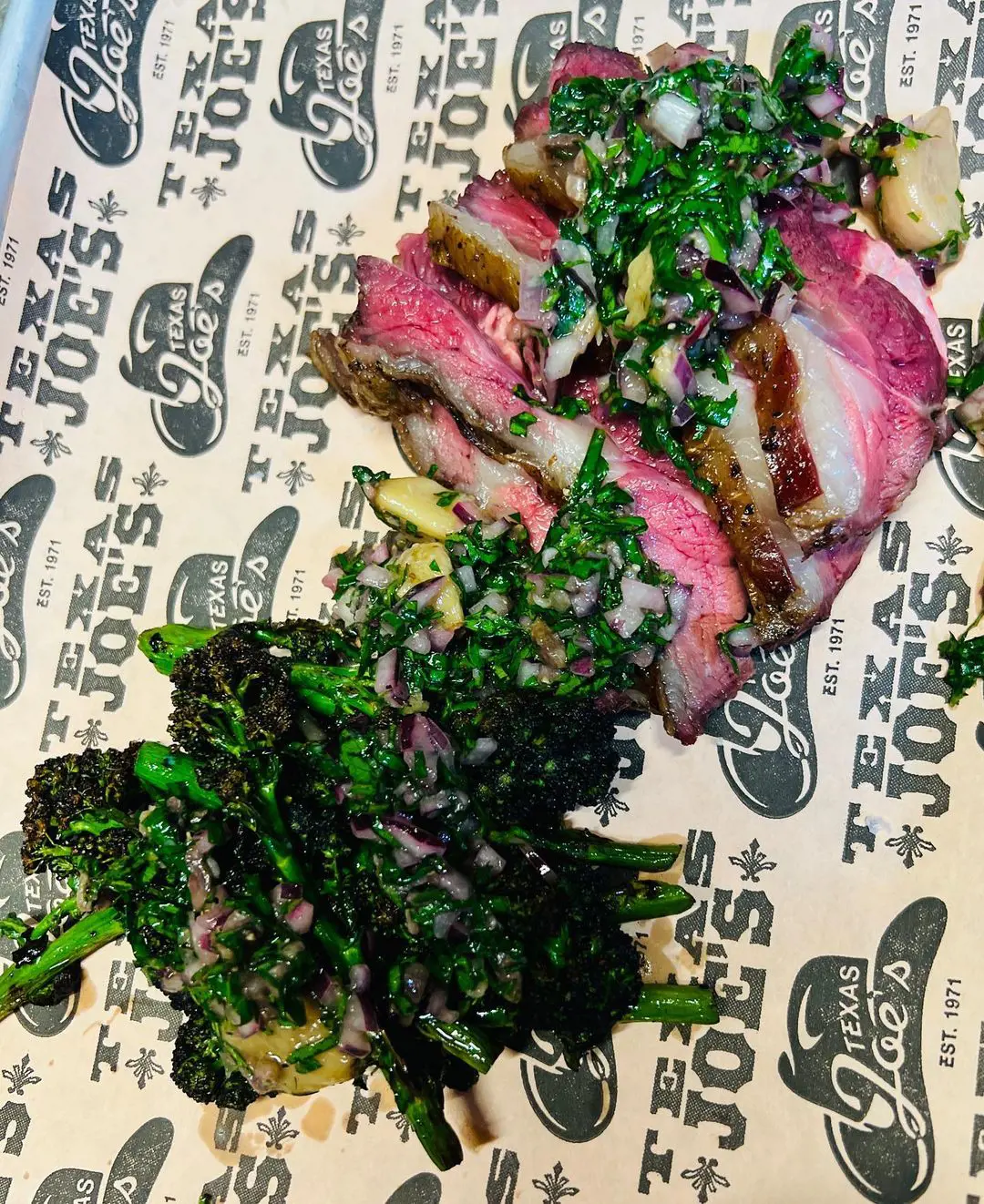 slow smoked goat with purple sprouting broccoli