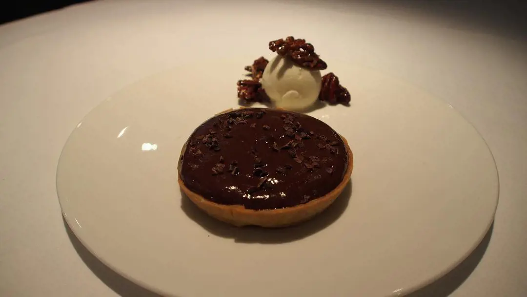 Warm chocolate mousse and salted caramel tartlet