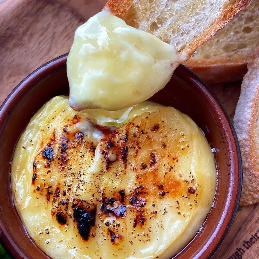 BAKED ST MARCELLIN CHEESE with Mountain Honey & Truffle oil