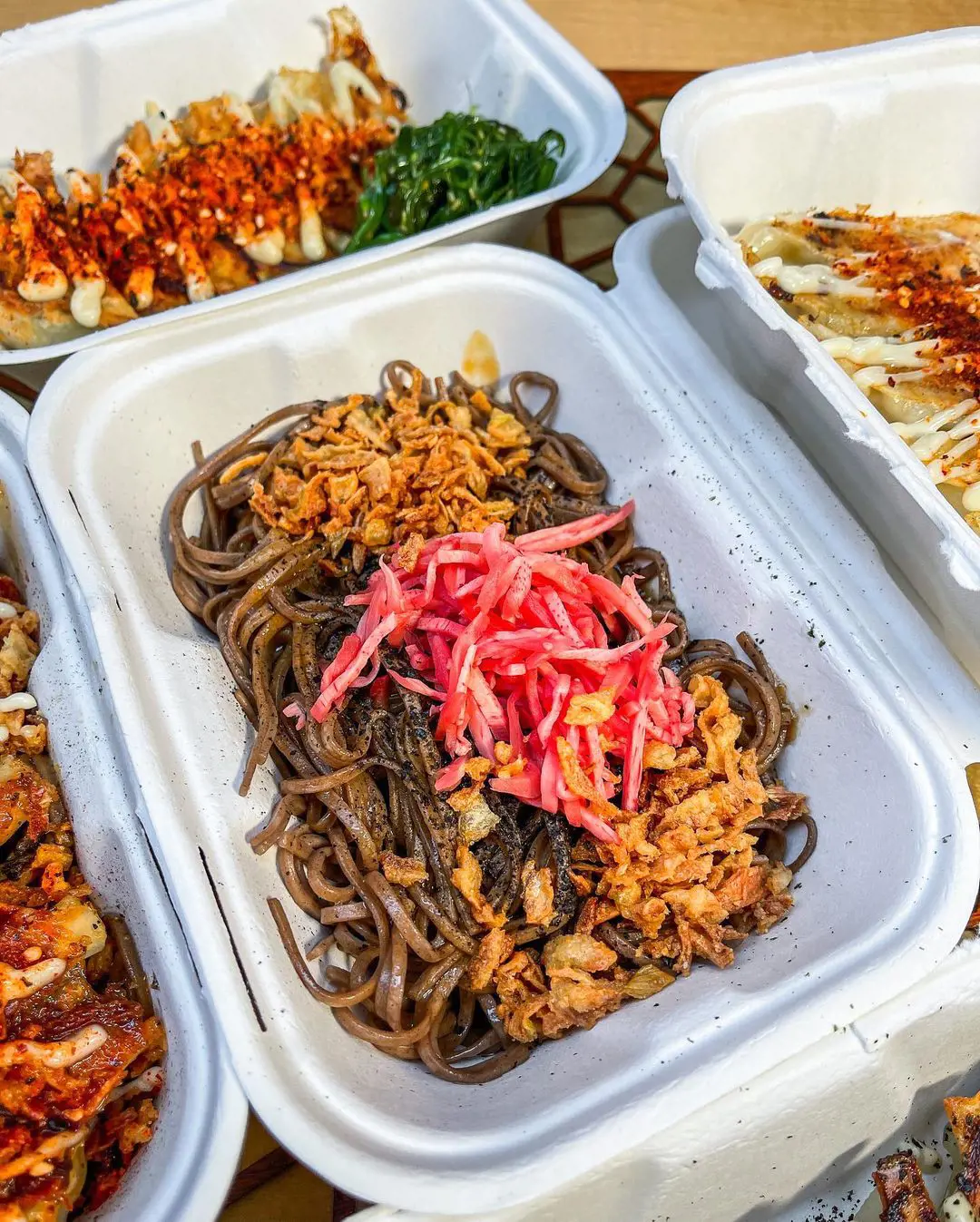 Soba noodles, crispy fried onions, and a helping of pink pickled onions