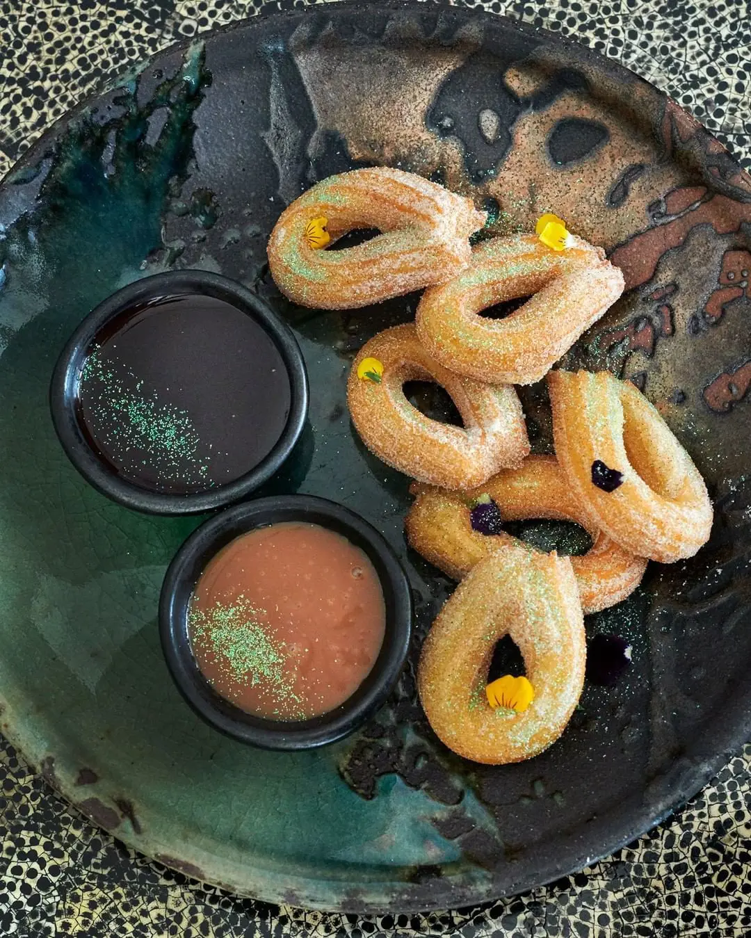 Mexican churros with caramel and chocolate feast